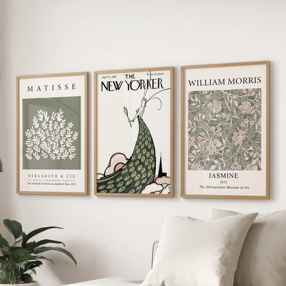 A gallery wall of 3 prints with Matisse-inspired forms and natural oak frames complements the lounge space over the sofa.