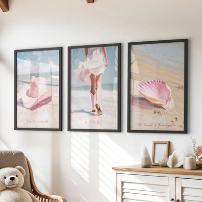 Pink seashells set of three wall art prints in sleek black frames, ideal for a kids room above the chest of drawers, adding breezy seaside color.