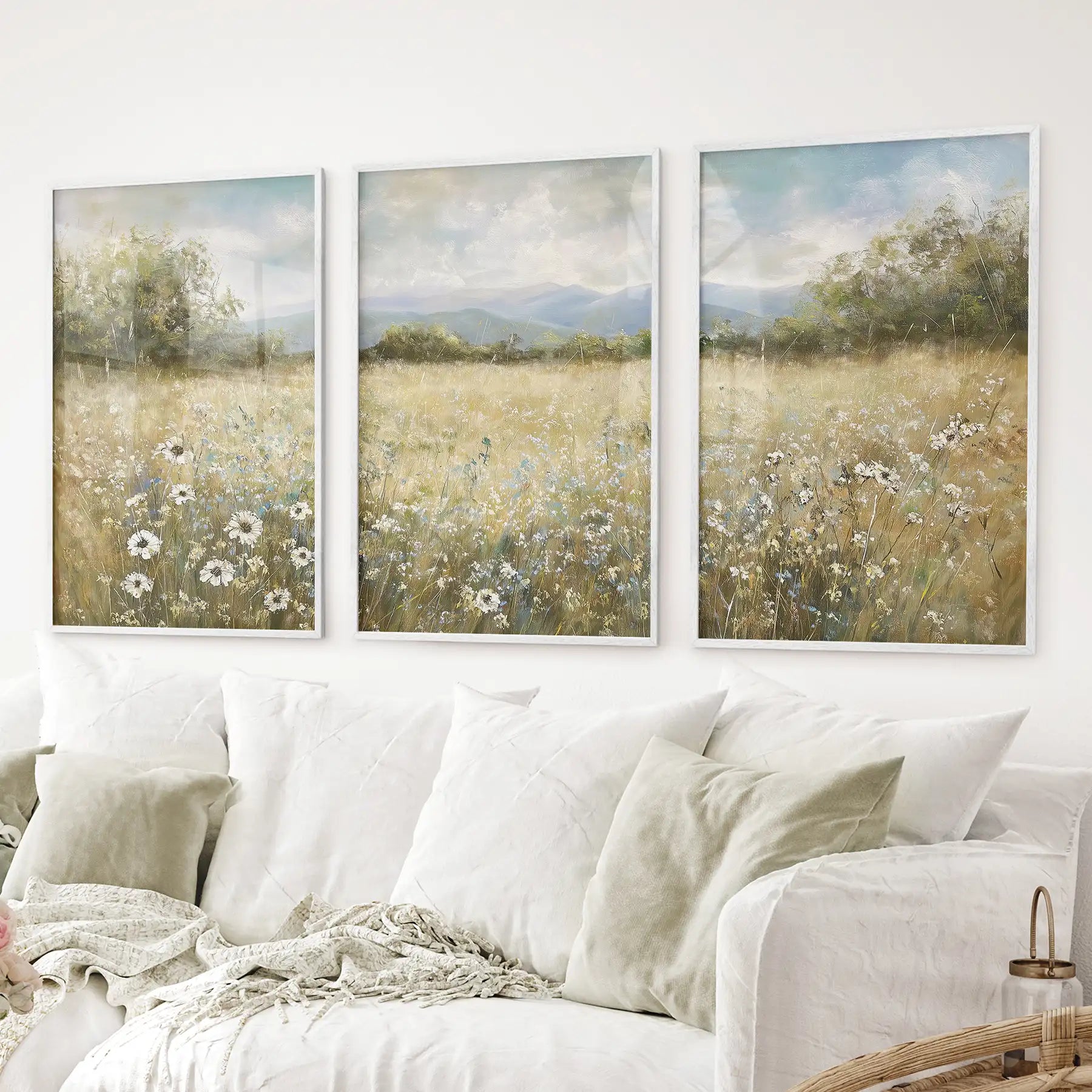 Rustic botanical landscape prints with golden grass and wildflowers. White frames for living room.