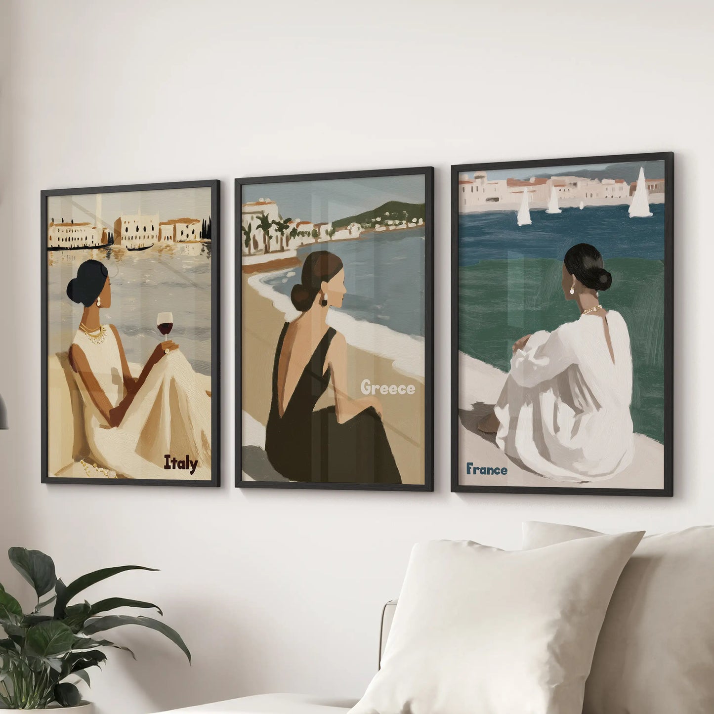 Mediterranean coastline villages 3-piece wall art spans the lounge above the sectional sofa, framed in matte black to channel breezy terrace views.
