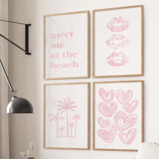 Meet Me At The Beach typography posters, a 4-print set in warm wood frames, sit above the sectional sofa and lend playful coastal color to the living room.