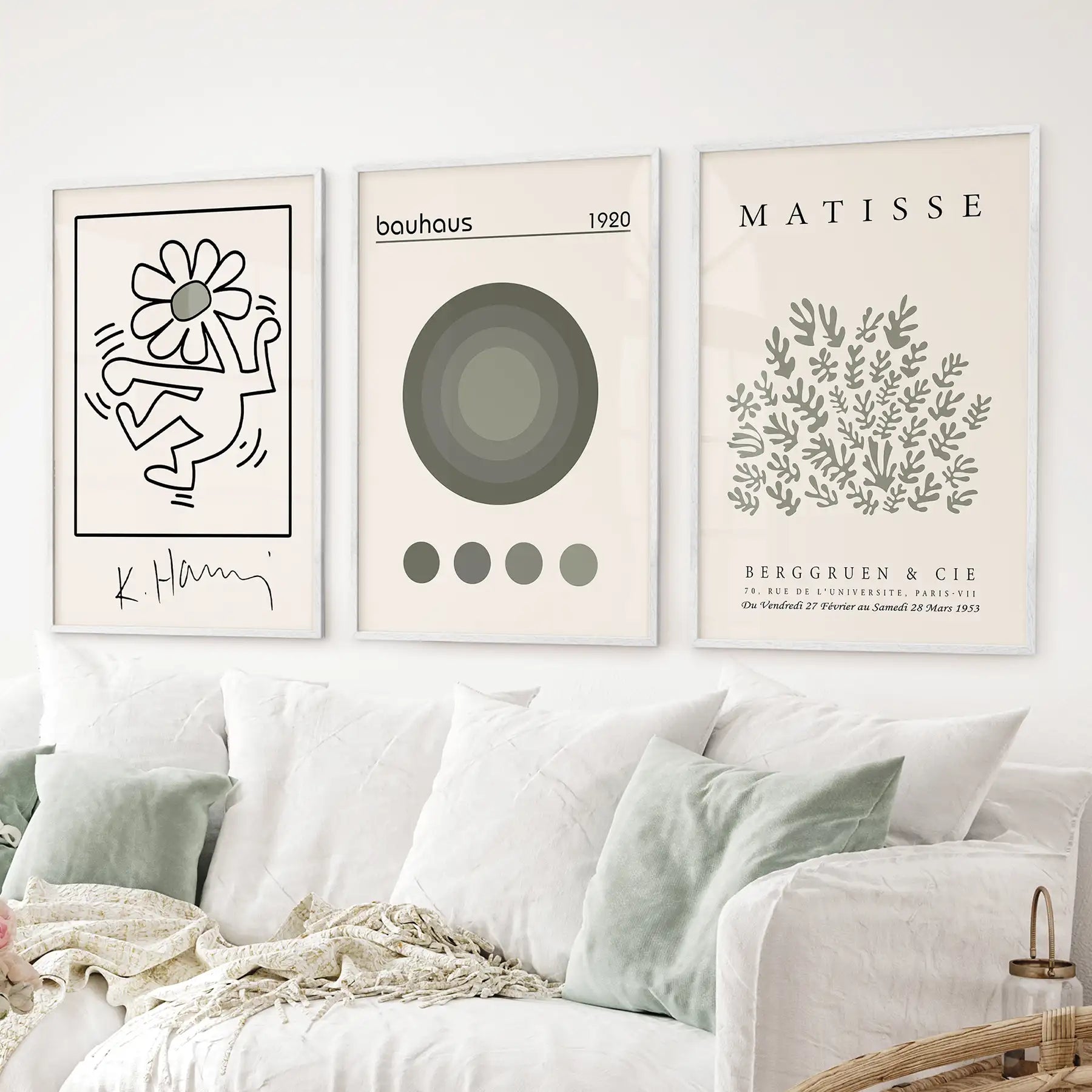 Sage green museum style art. Modern mid century wall art decor. White frames above the sofa. 
