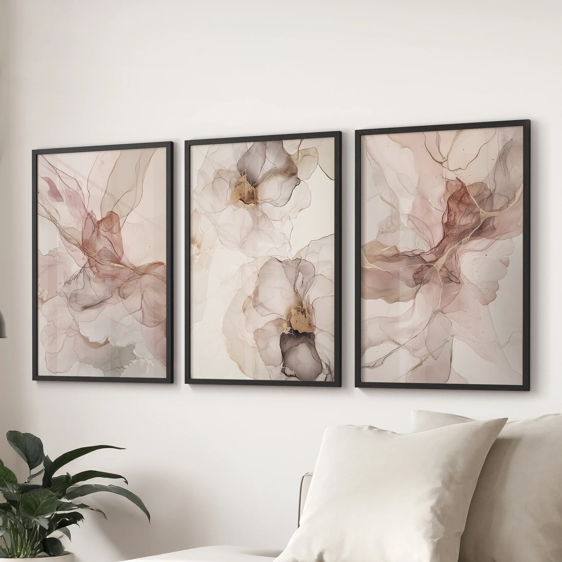 Soft neutral watercolor abstract wall prints, art set of three, in black frames to layer quietly above the lounge couch with an airy, relaxed feel.