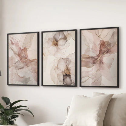 Soft neutral watercolor abstract wall prints, art set of three, in black frames to layer quietly above the lounge couch with an airy, relaxed feel.
