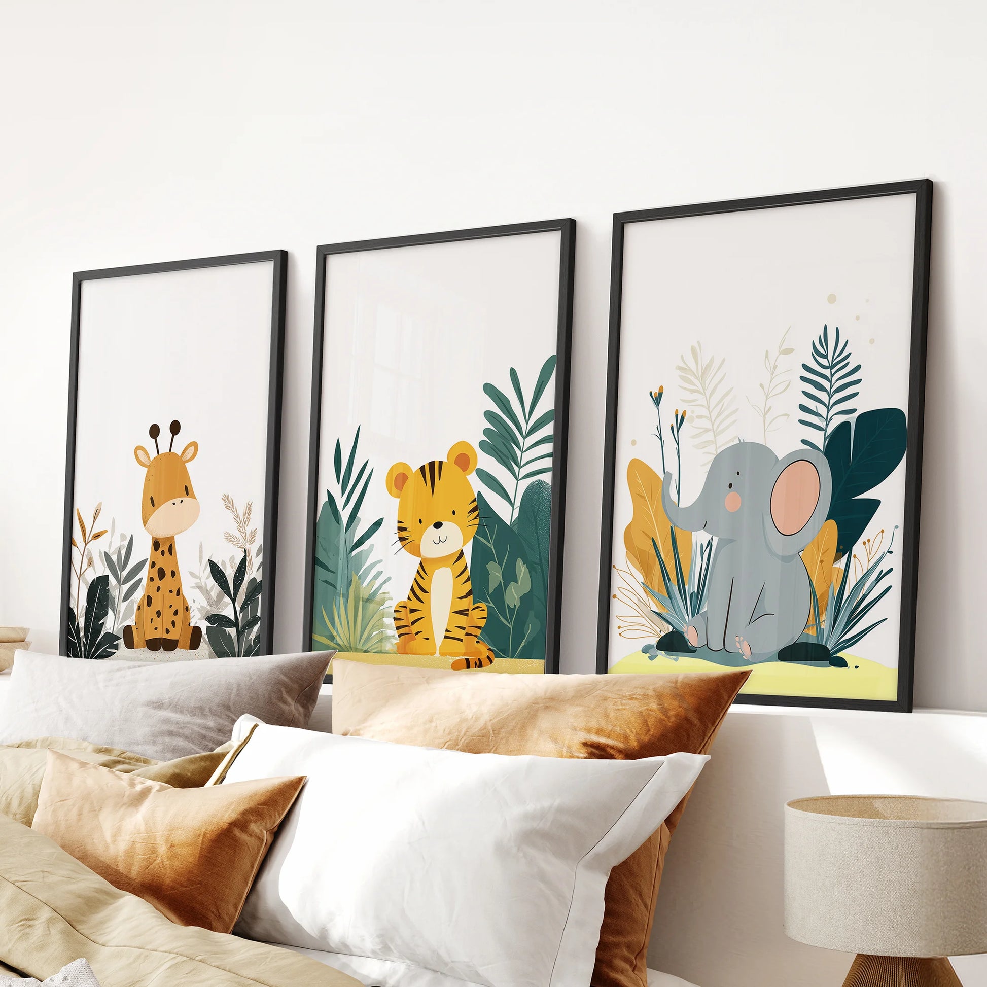 Watercolor nursery animals 3-piece wall art in black frames, arranged over the bed to bring gentle safari charm to a calm bedroom.