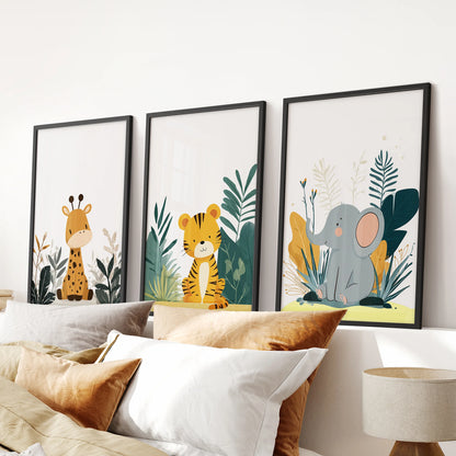 Watercolor nursery animals 3-piece wall art in black frames, arranged over the bed to bring gentle safari charm to a calm bedroom.