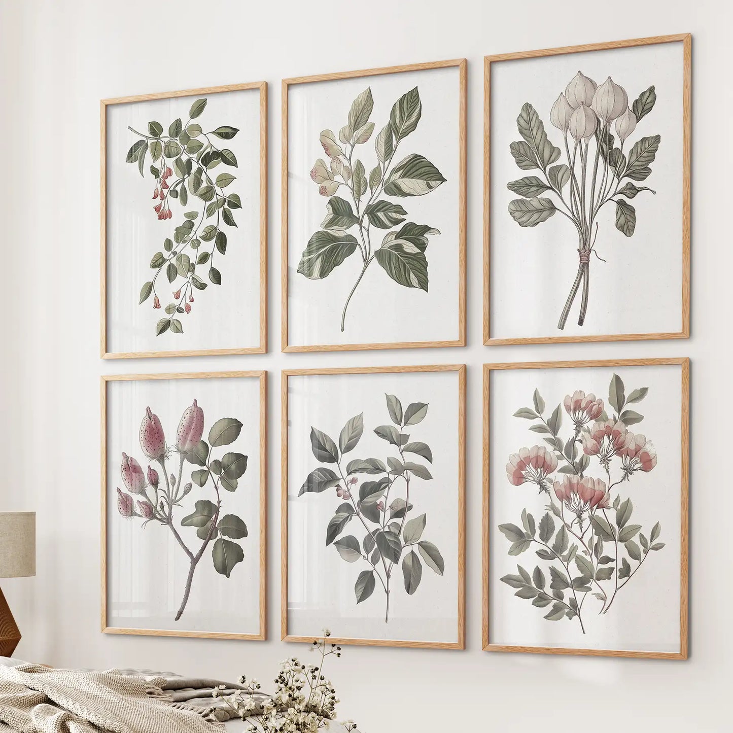 Farmhouse kitchen vintage wall art. Trendy cotton flower watercolor posters. Thinwood frames over the bed.
