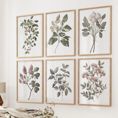 Farmhouse kitchen vintage wall art. Trendy cotton flower watercolor posters. Thinwood frames over the bed.