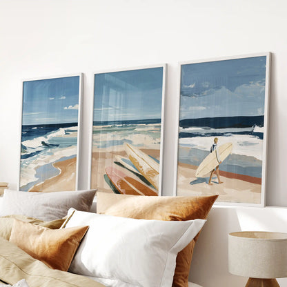 A white-framed trio of surfer posters crowns the headboard, adding sun-touched energy and open-water flow to the bedroom.