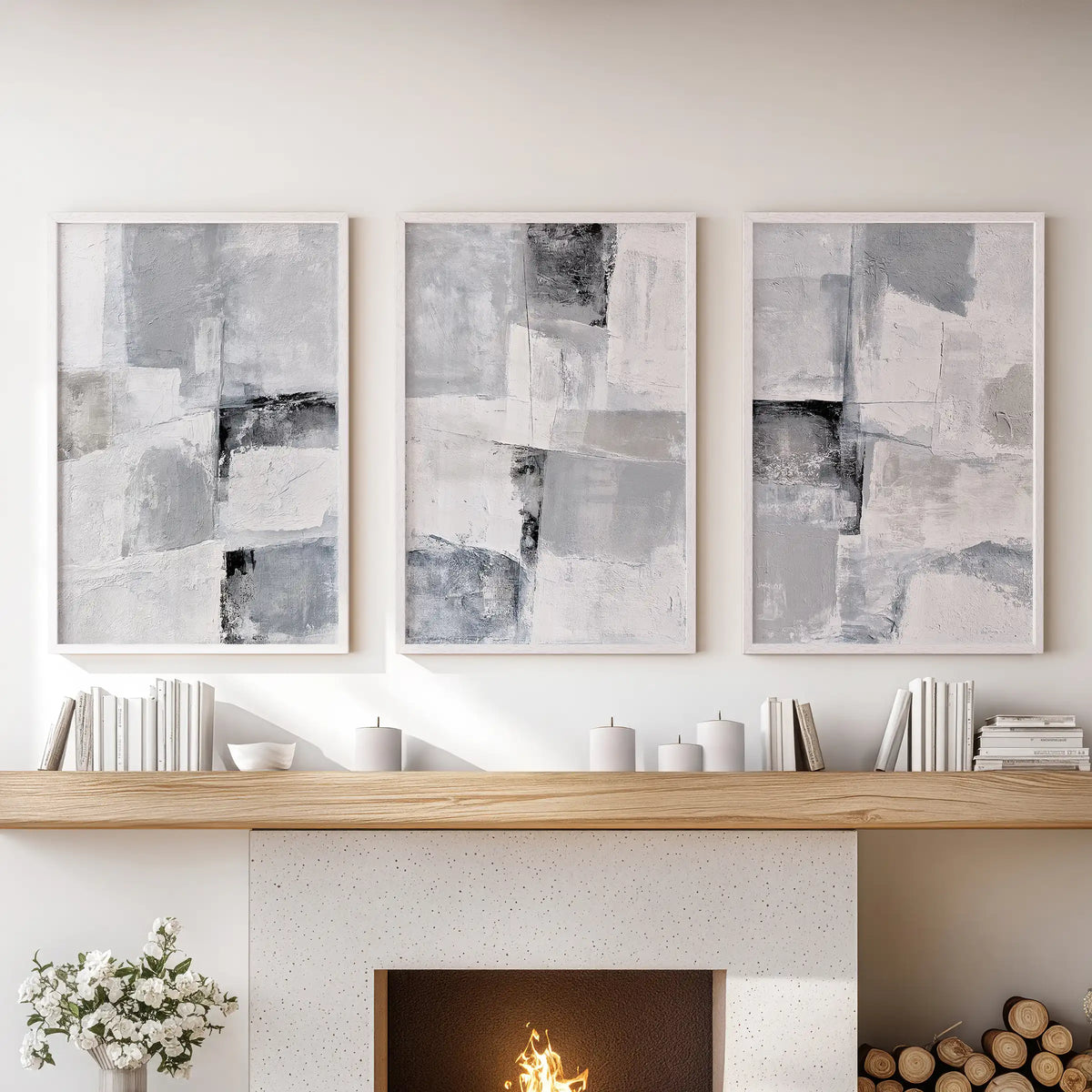 Plaster-effect minimal art set of three pictures brings quiet texture above the fireplace in the sitting room, shown in airy white framed prints.