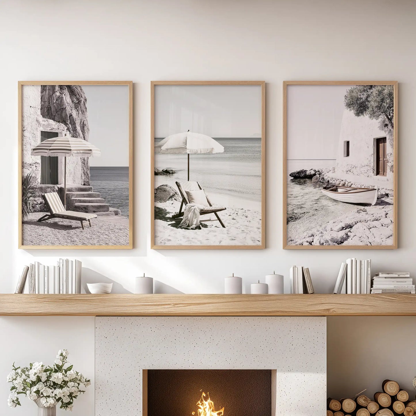 Neutral-toned coastal landscapes, a wall-hanging art trio in oak wood frames, styled over the fireplace to ground the lounge with understated shoreline texture.