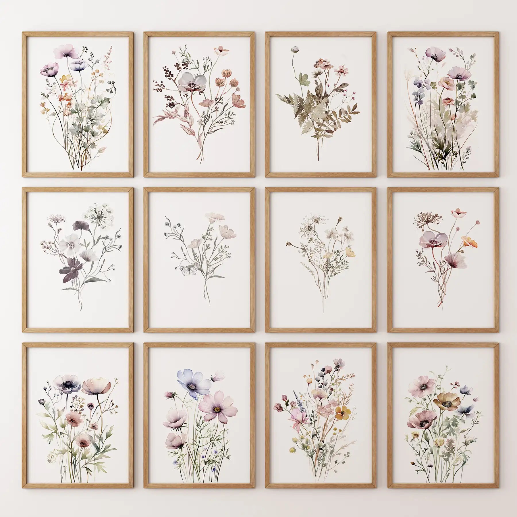 Set of 12 watercolor wildflower prints featuring soft neutral florals like poppies, cosmos, and ferns. Thinwood frames for living room.