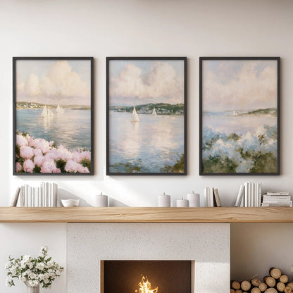 Nantucket sailboats three-piece framed art set steadies the family room over the mantelpiece, crisp black frames showcasing harbor sails and pale sky.