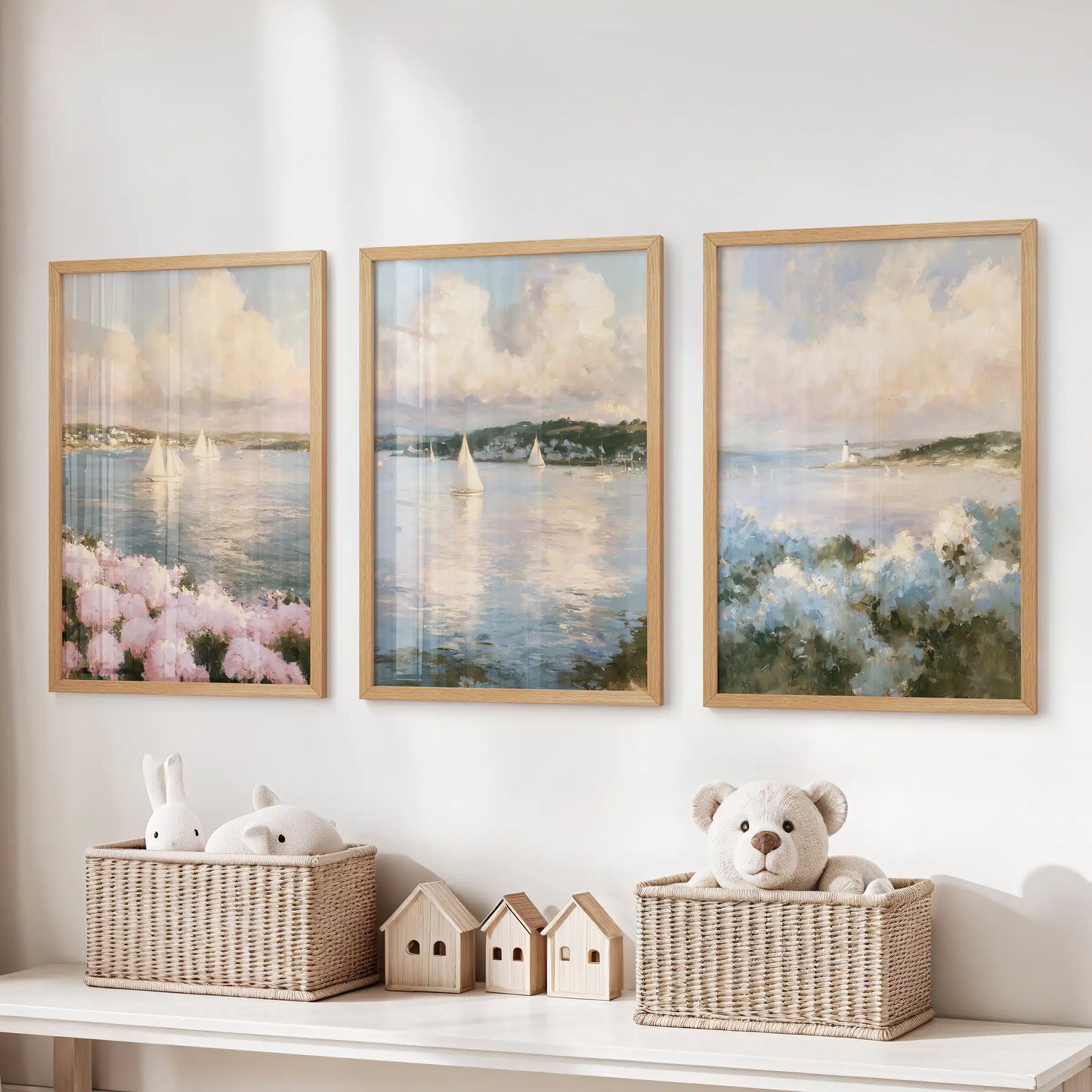 Cape Cod shoreline wall art 3 piece set centers the playroom above the toy organizer, light oak frames keeping the coastal path and sea grass tidy.