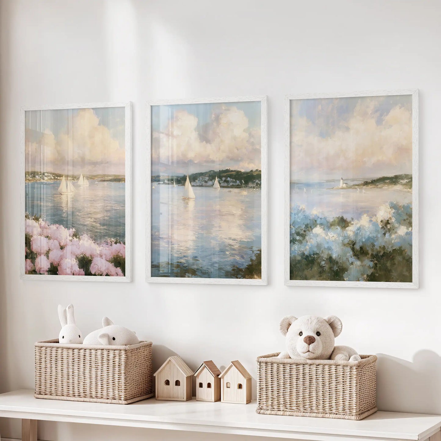 Cape Cod shoreline set of three art prints hovers over the kids room storage bench, white framed to keep the sand, surf, and horizon neatly grouped.