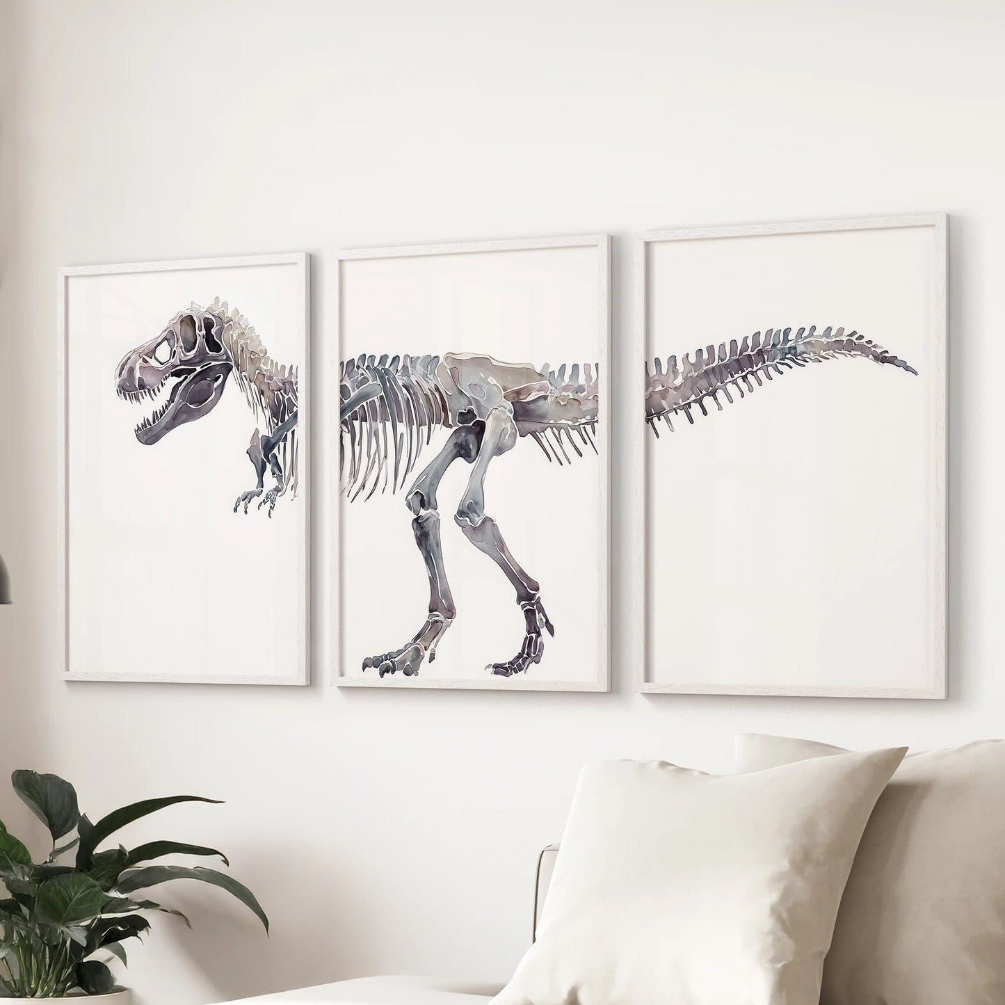 A 3-piece paleontology wall art collection in white frames decorates the lounge above a sectional sofa with airy, scholarly character.