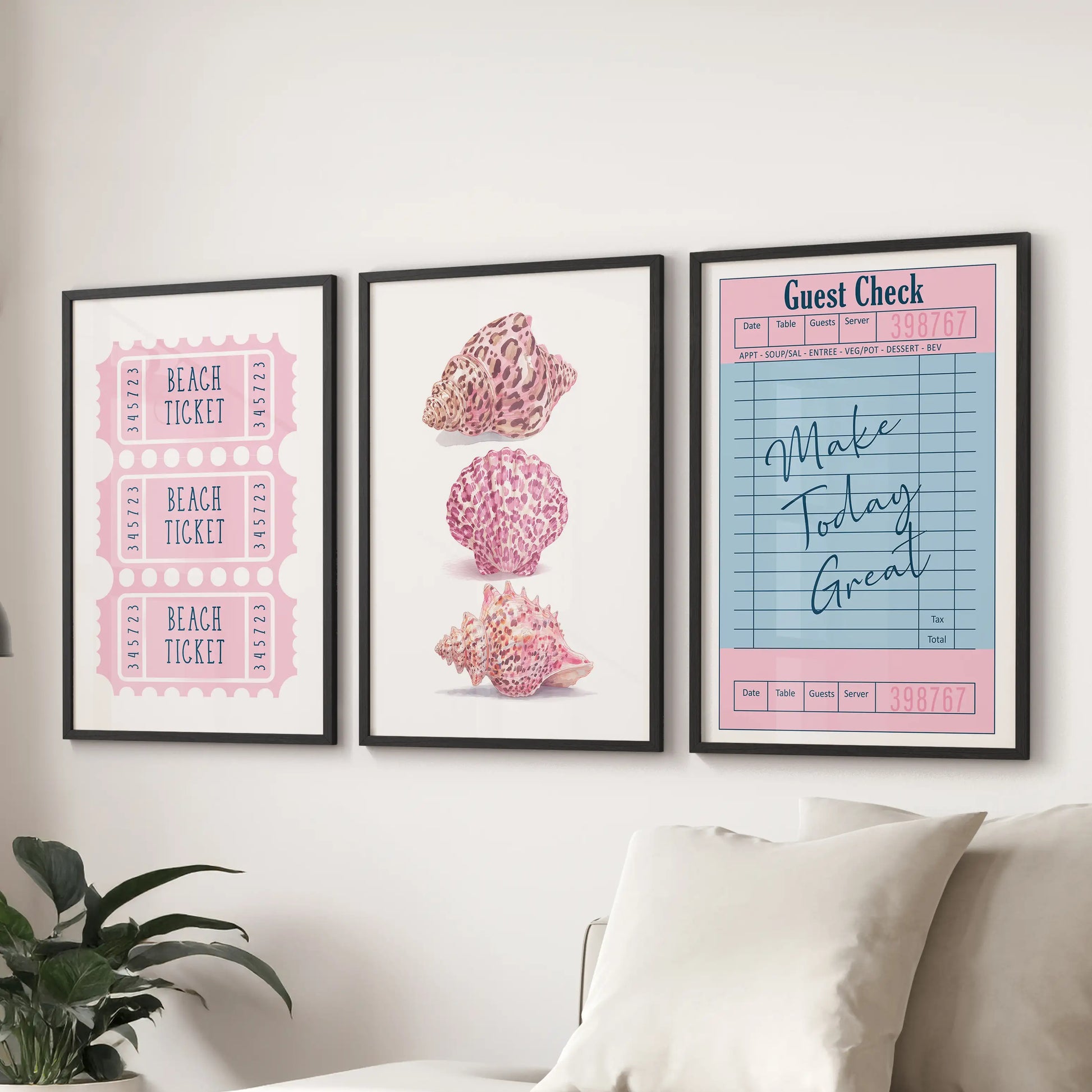 A modern 3-piece beach ticket wall art set in black frames adds a clean pop of pastel color above the lounge sectional sofa.
