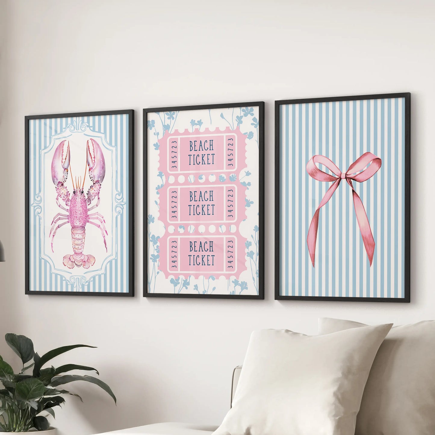 Coquette bows and ribbons 3-print wall art set in black frames adds playful pink-and-blue charm above the lounge sofa.