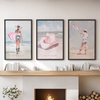 Long Live Cowgirls typography trio of wall art pictures, set above the family room mantle in slim black frames for a fresh, coastal pink accent.