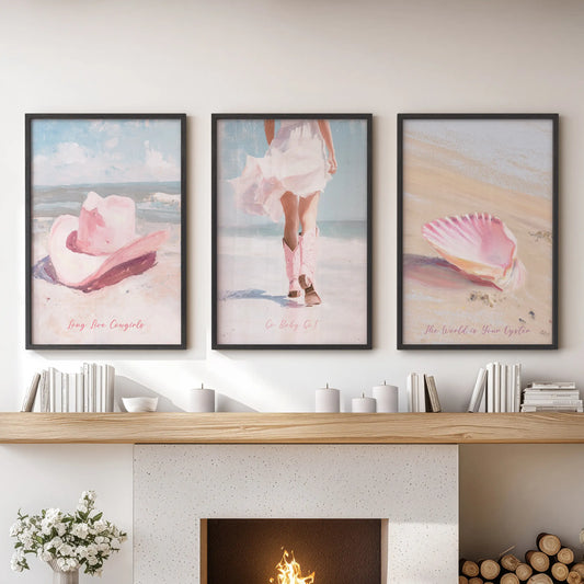 Coastal cowgirl aesthetic three-piece wall art set in a black frame finish, mounted over the lounge fireplace mantel for a sunlit, beach-meets-west look.