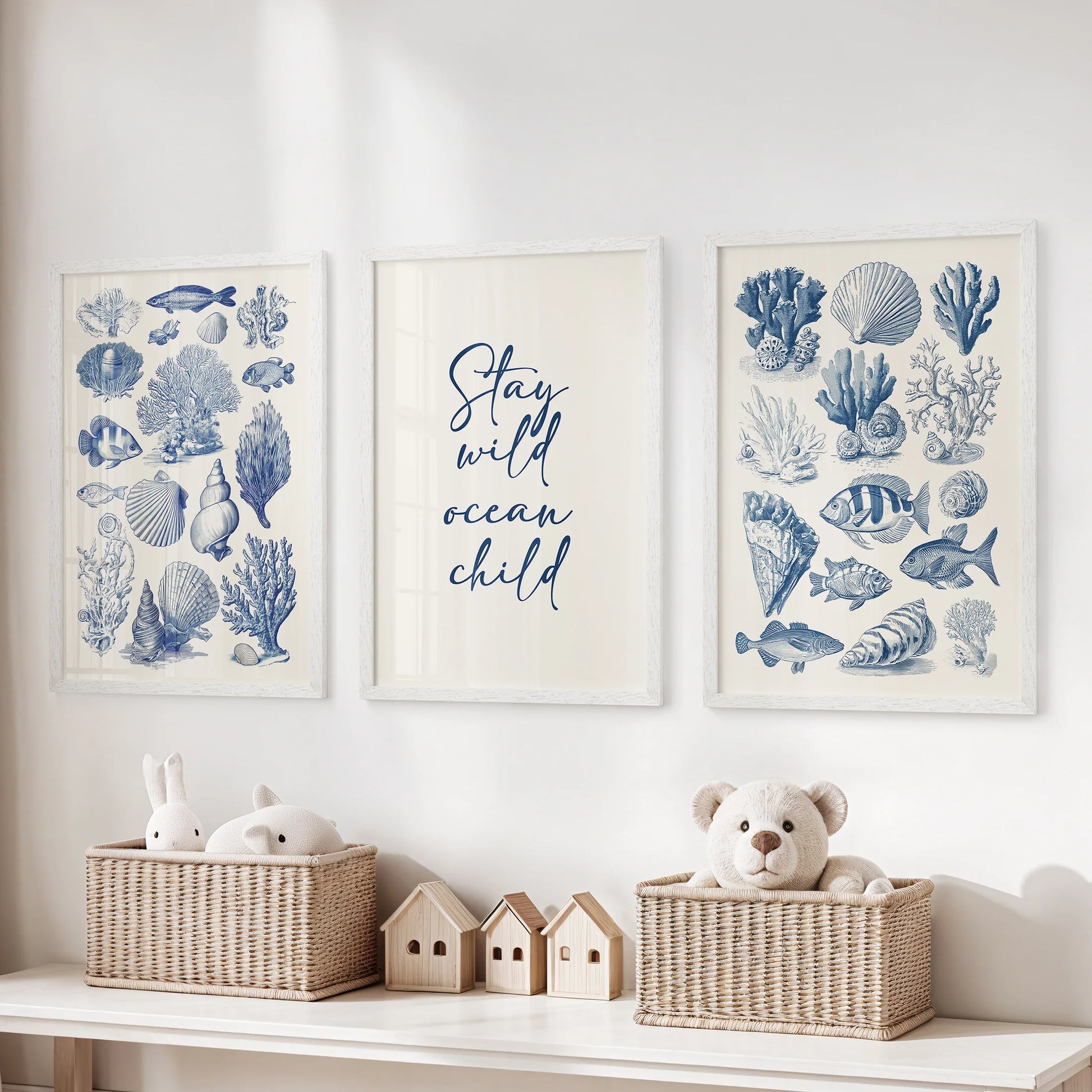 Playful ocean scene posters, three-piece bundle in white frames for a playroom, arranged over the toy organizer to keep the wall lively.