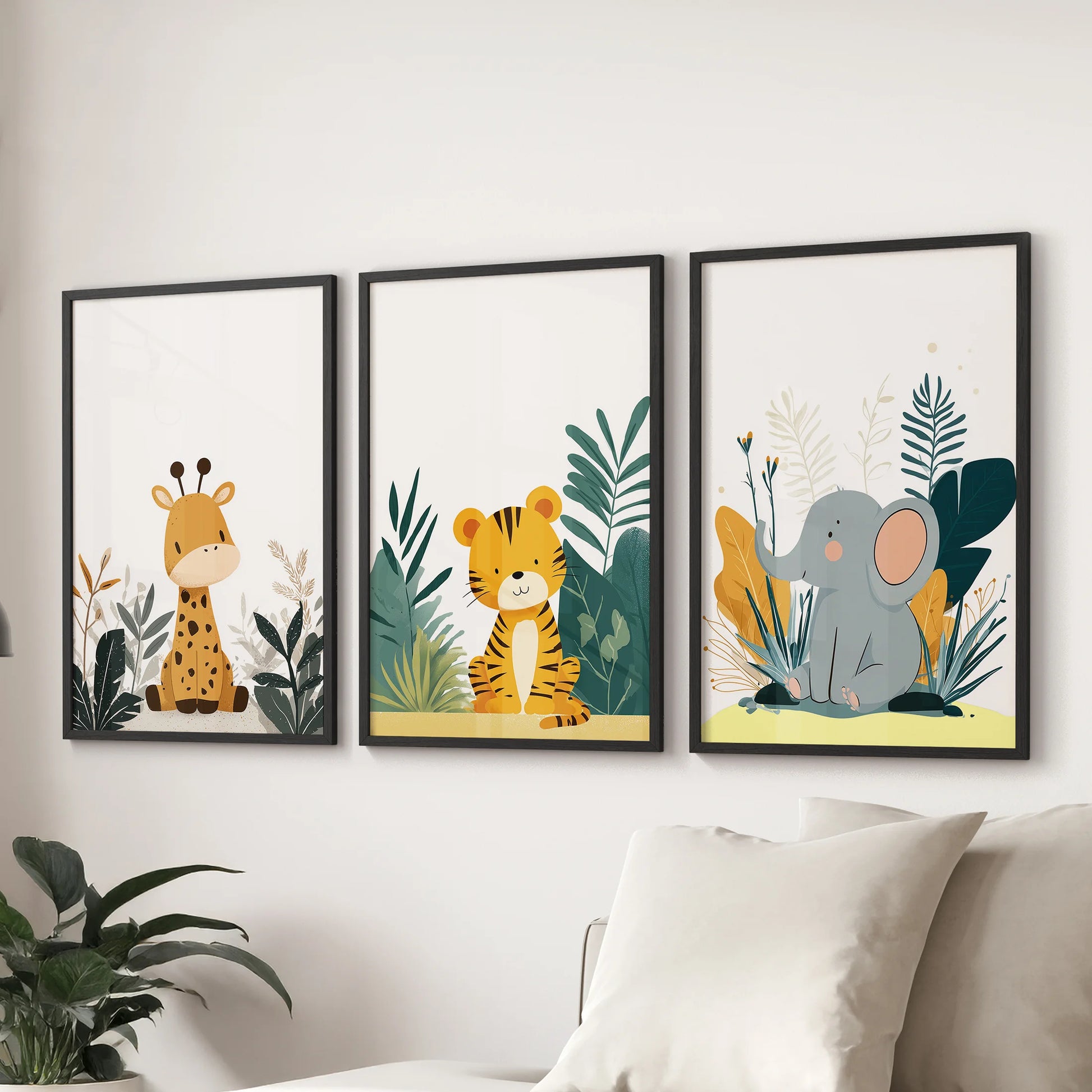 Nursery wildlife trio, a gallery of 3 black-framed prints, creates a playful focal wall in the sitting room behind the couch.