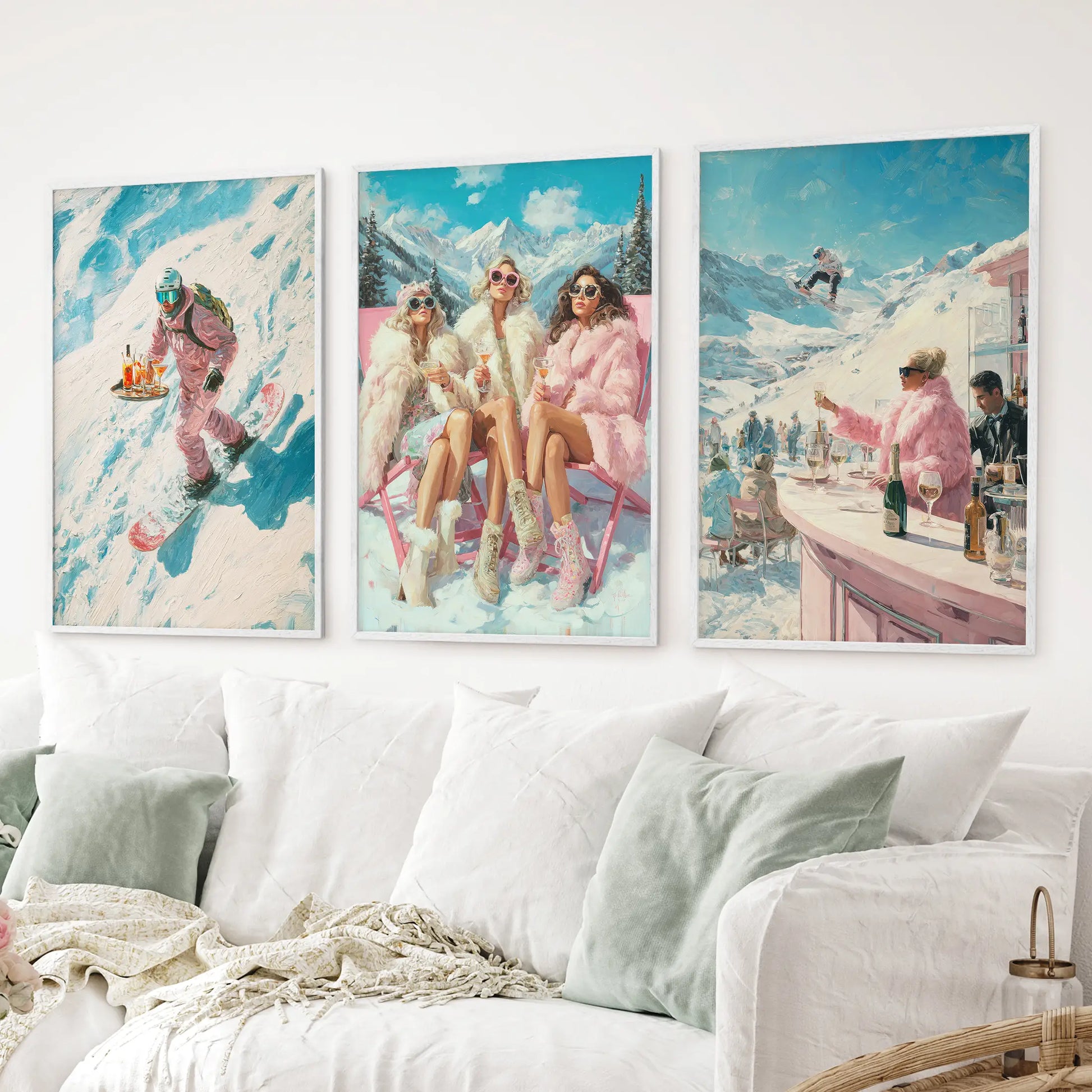 Glam ski lodge wall decor with apres bar and retro prints. White frames above the sofa.