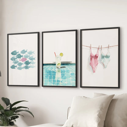 Pool party posters, a three-print wall art set in black frames, styled above the lounge sectional to splash the room with bright, summery color.
