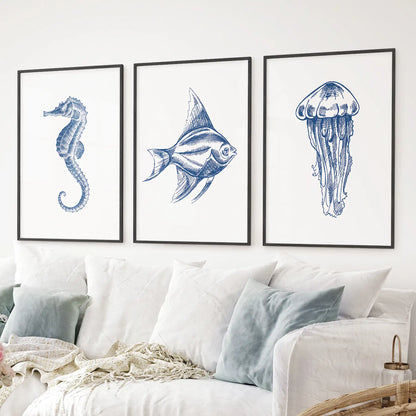 Nautical artwork vertical wall prints. Coastal minimalist contemporary sea life posters. Black frames above the sofa.