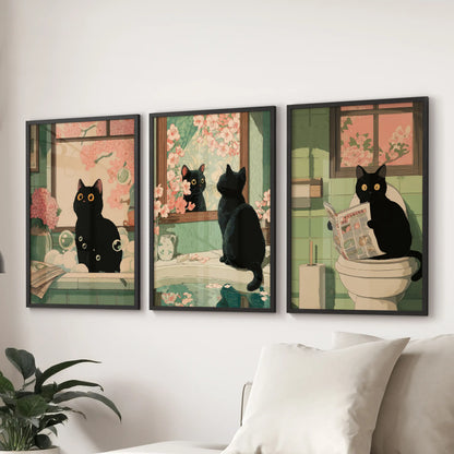 Maximalist Japanese cat illustration, a set of three black-framed wall prints, anchors the living room display behind the couch with bold whimsy.