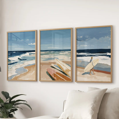 Surfer riding a wave wall art prints, a set of three in solid oak frames, float above the sectional to bring laid-back coastal rhythm to the living room.