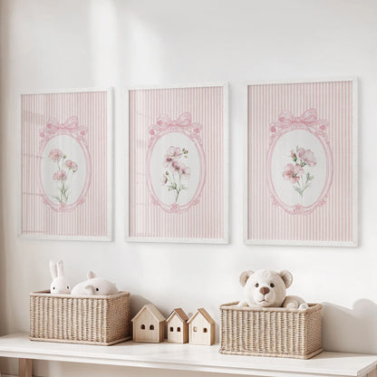 Three-piece poster set of retro botanical artwork in white frames above a toy organizer in the playroom.