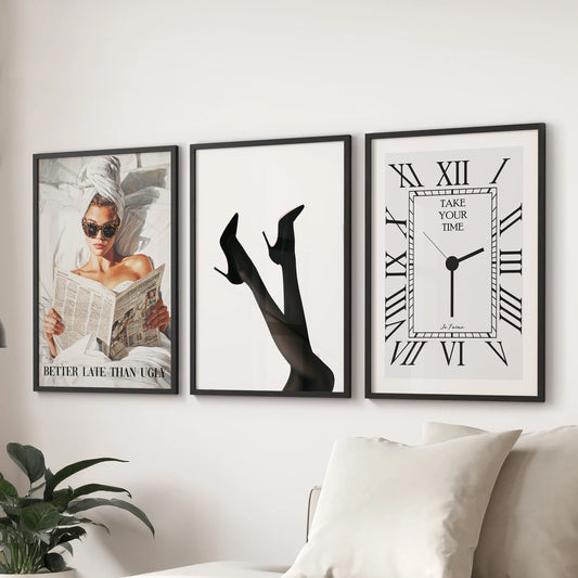 Black framed prints in a 3-piece wall art set bring a retro coquette vibe, over the couch to style the family room with runway chic polish.