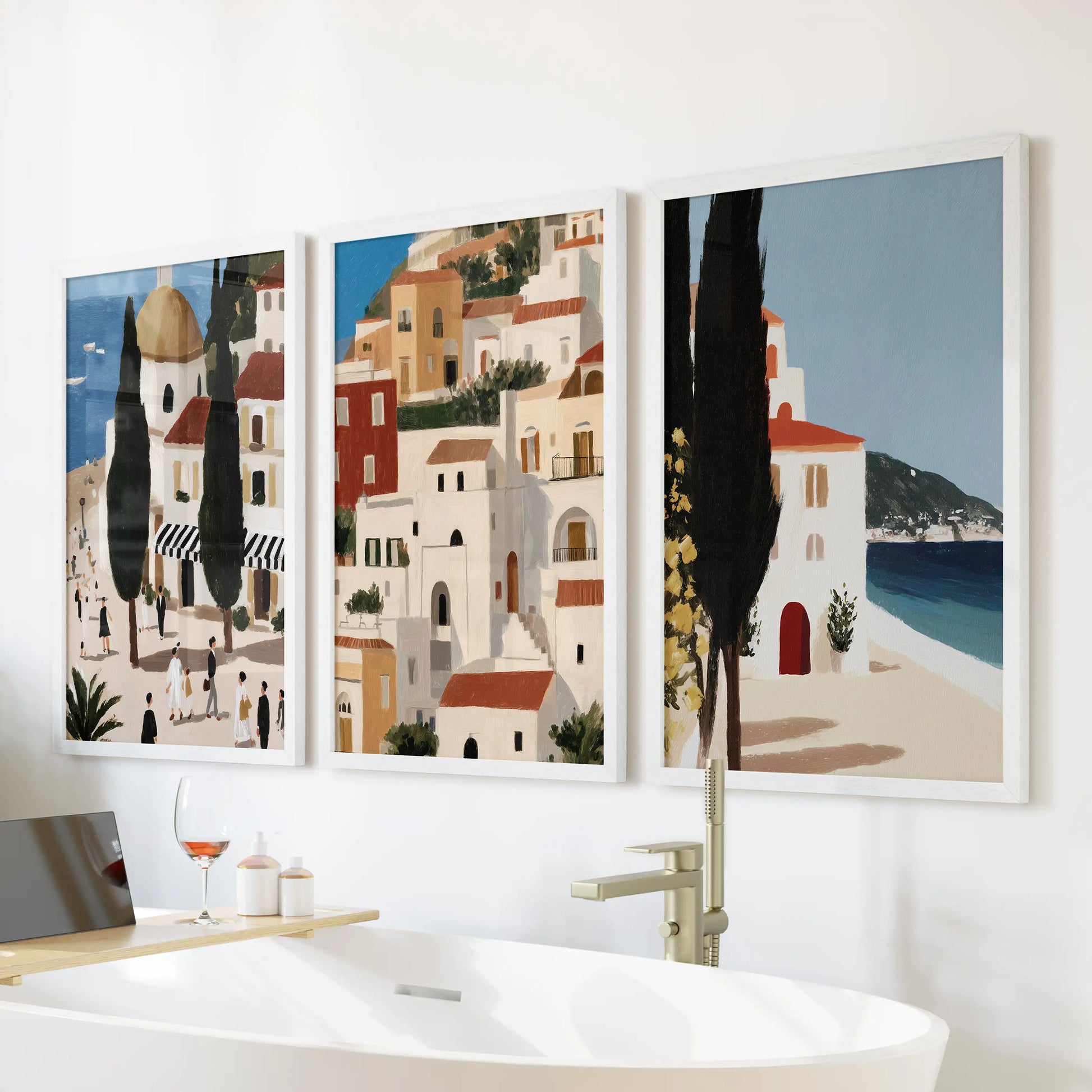 Retro Spain travel wall art, three-piece set in white frames, looks crisp over the tub and brings sun-washed Mediterranean charm to the bathroom.
