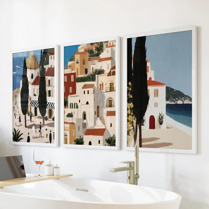 Retro Spain travel wall art, three-piece set in white frames, looks crisp over the tub and brings sun-washed Mediterranean charm to the bathroom.