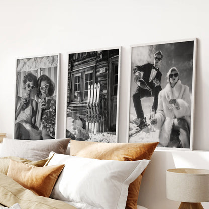 Three white-framed prints of bar-cart pints line the wall above the bed’s headboard, adding playful retro-ski energy to the bedroom décor.