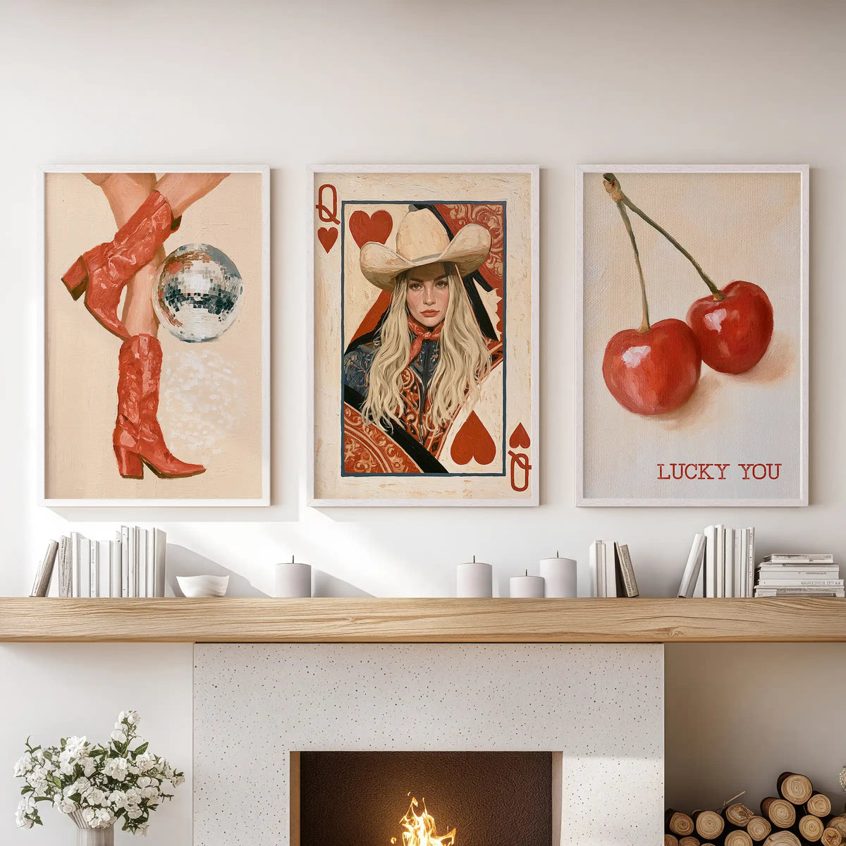 Three Disco cherries wall art pictures in white frames glow above the hearth, adding playful cocktail-hour energy to the family room.