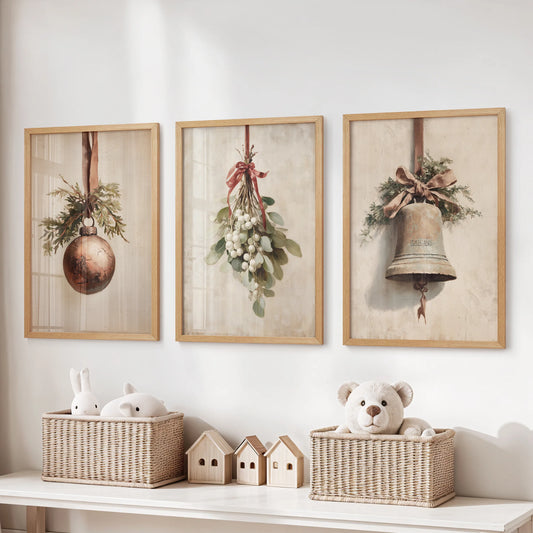 Rustic Christmas prints, a 3-piece wall art set in light wood frames, hang above toy storage to warm a kids room with natural, homespun cheer.