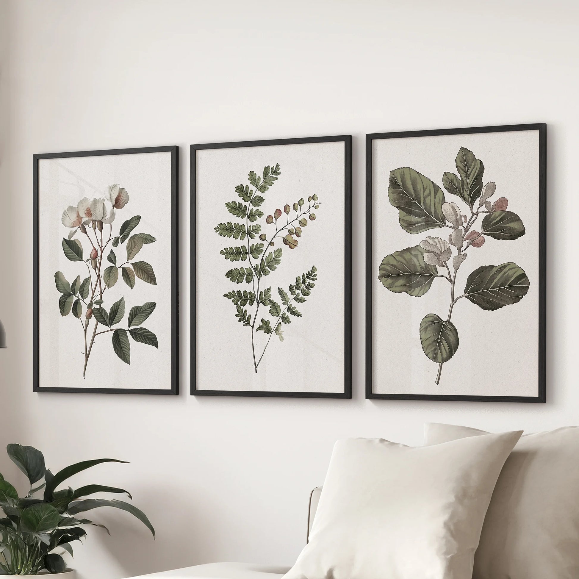 French country botanicals wall art, a 3-piece collection in black frames, anchors the lounge over the sectional with softly aged, garden-inspired detail.