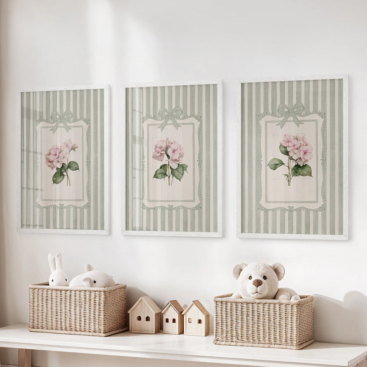 Three-piece wall decor set with sage green striped botanicals in white frames above a storage bench in a kids' playroom.