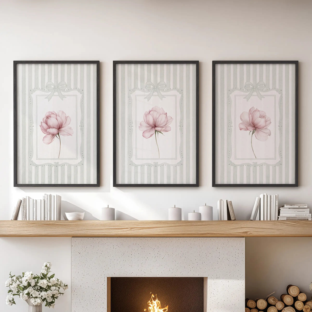 Set of three floral posters in black frames, featuring pink peonies on sage green stripes above a lounge fireplace mantel.