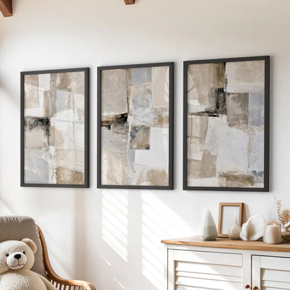 Organic minimalist shapes in a set of three framed prints style a kids playroom above the chest of drawers, paired with crisp black frames.