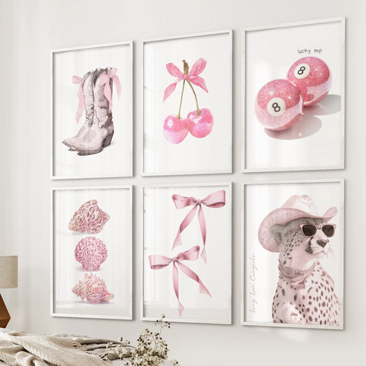Seashell illustrations six-piece poster set showcases coastal motifs in crisp white frames, hung beside the bed on the bedroom wall for breezy, preppy charm.