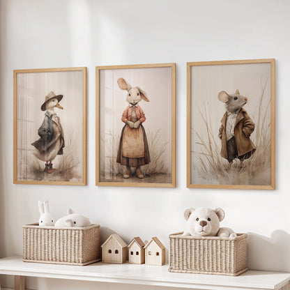 Cottagecore farm animal prints, a three-piece wall-hanging set in natural oak frames, sit above the playroom storage bench for warm, seasonal charm.