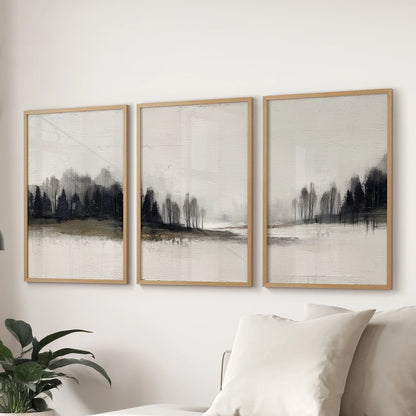 Watercolor forest landscapes, a three-print wall art set with wood-framed prints, anchors the sitting room behind the sectional sofa.
