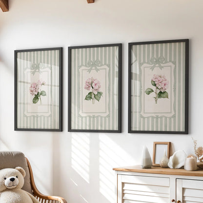 Three-print wall art set featuring pink hydrangea blooms in black frames above a dresser in a kids' room.