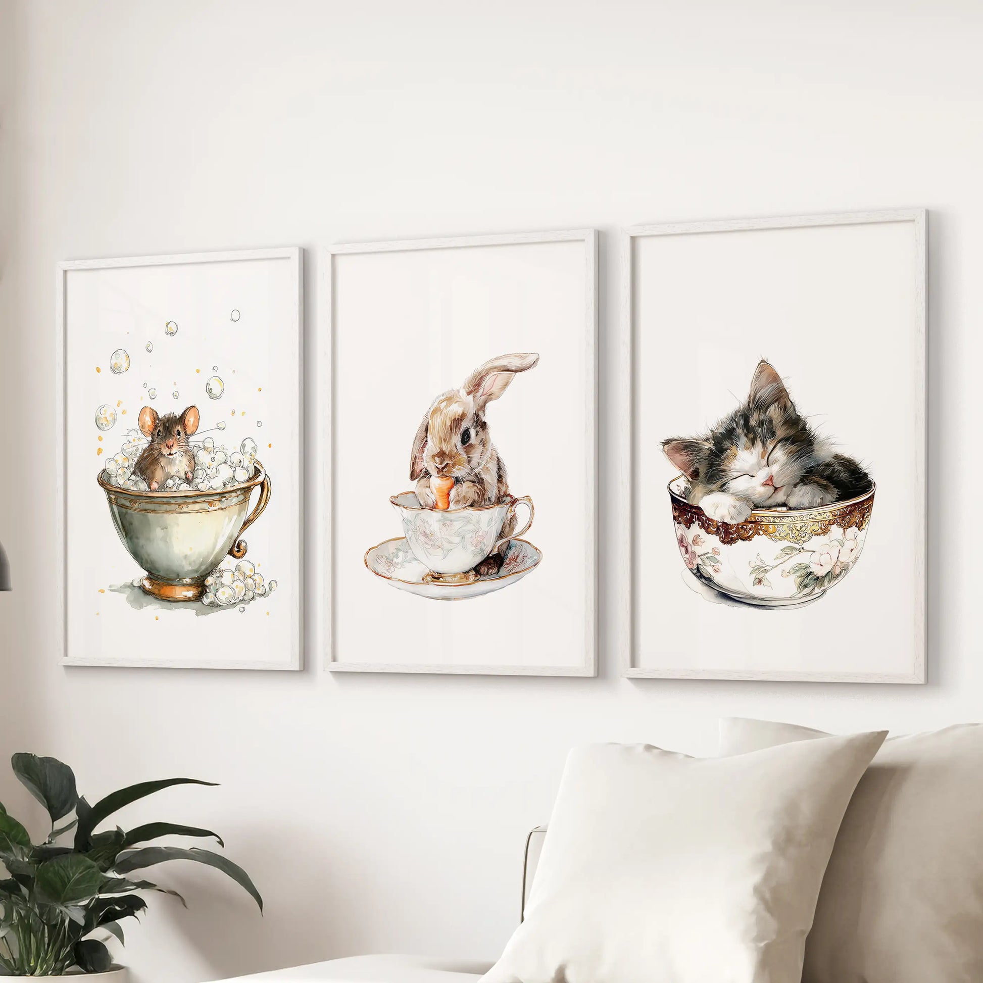 Three white-framed wall art pieces with vintage watercolor nursery animals gather above the sectional for a tender family room accent.