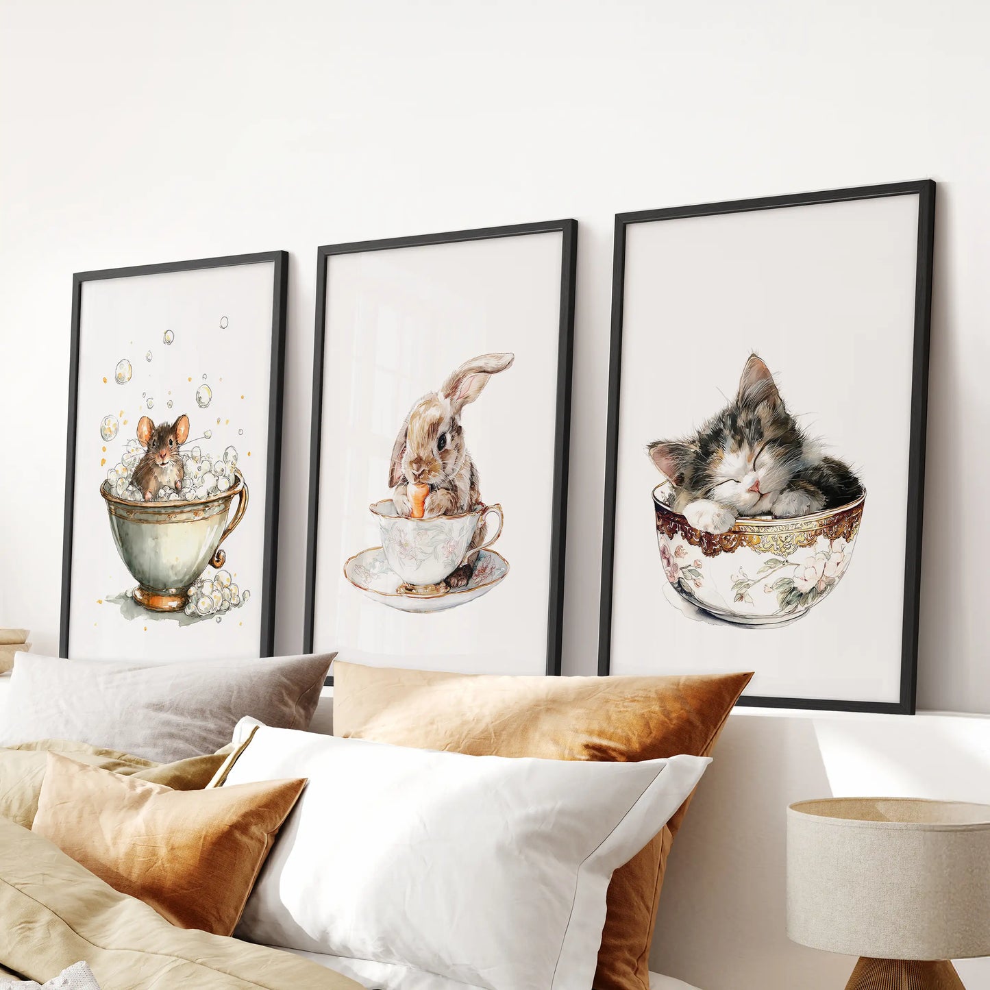 Above the bed’s headboard, a 3-piece black-framed wall decor of a sleepy kitty in a cup lends the bedroom a mild vintage watercolor feel.
