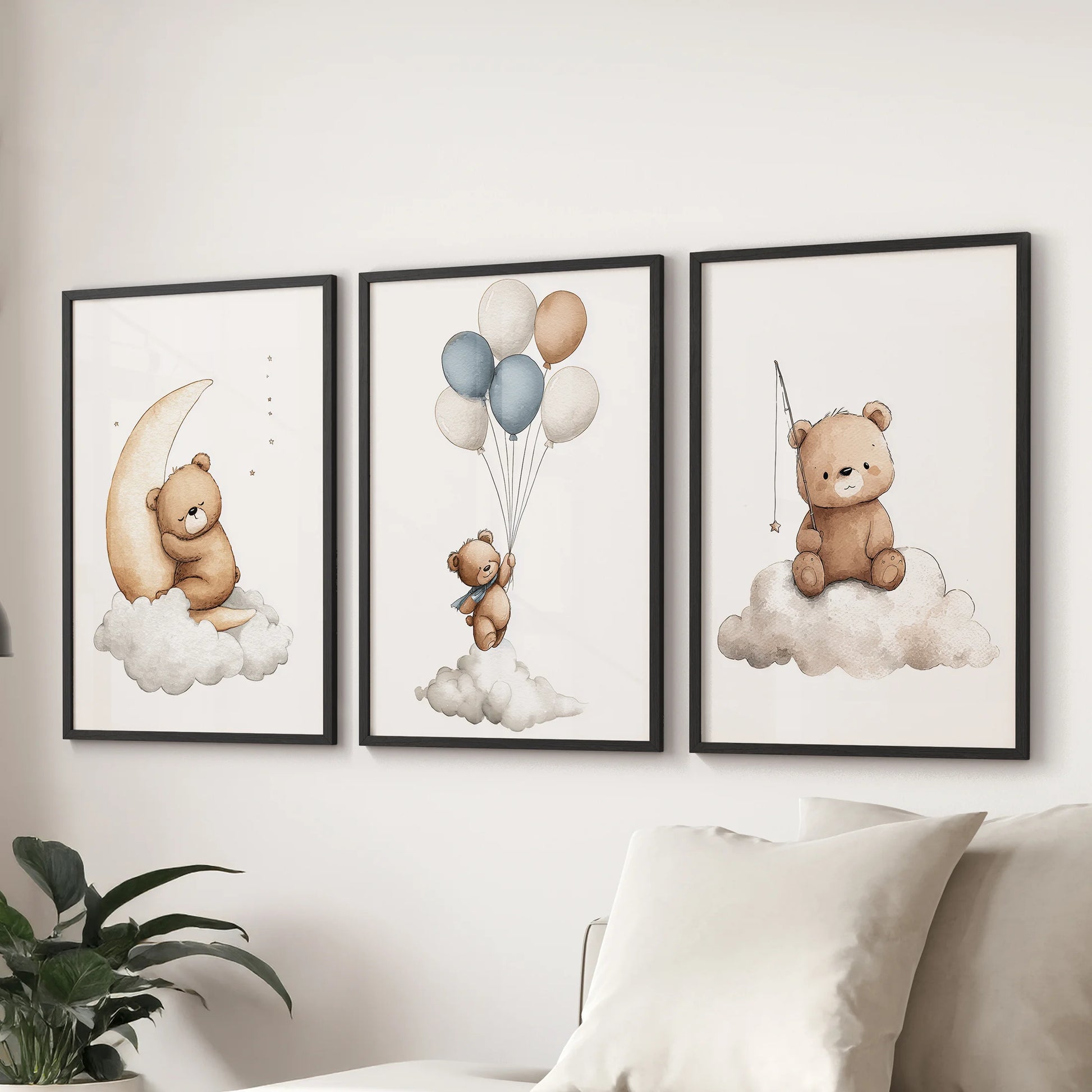Minimalist nursery prints set of 3, teddy bears in black frames on white wall. Black frames over the couch.