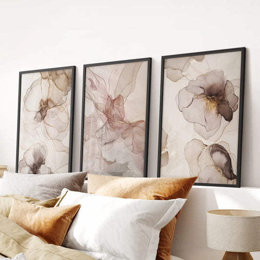 Blush pink and beige abstract watercolors, a three-piece wall art set in black-framed prints for the bedroom, designed to hang over the headboard.